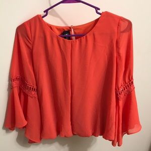An peach blouse